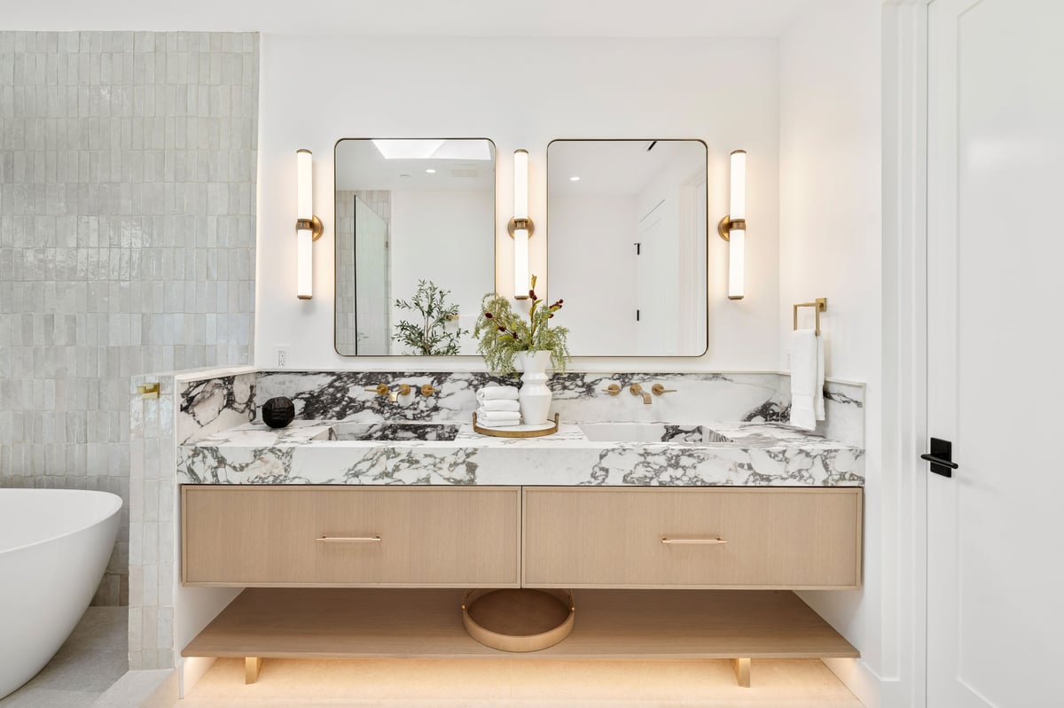 Modern bathroom with dual mirrors and vanity