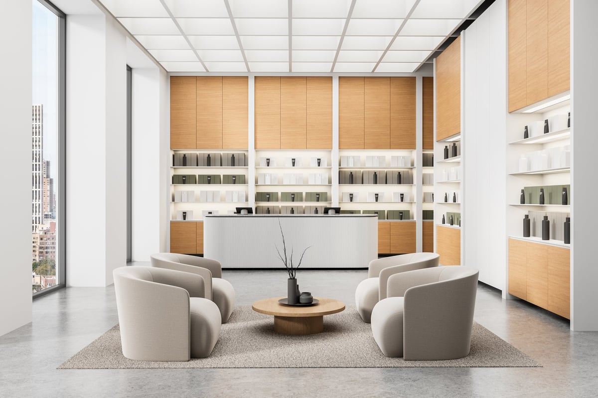 Stylish reception interior with wood cabinetry and city views